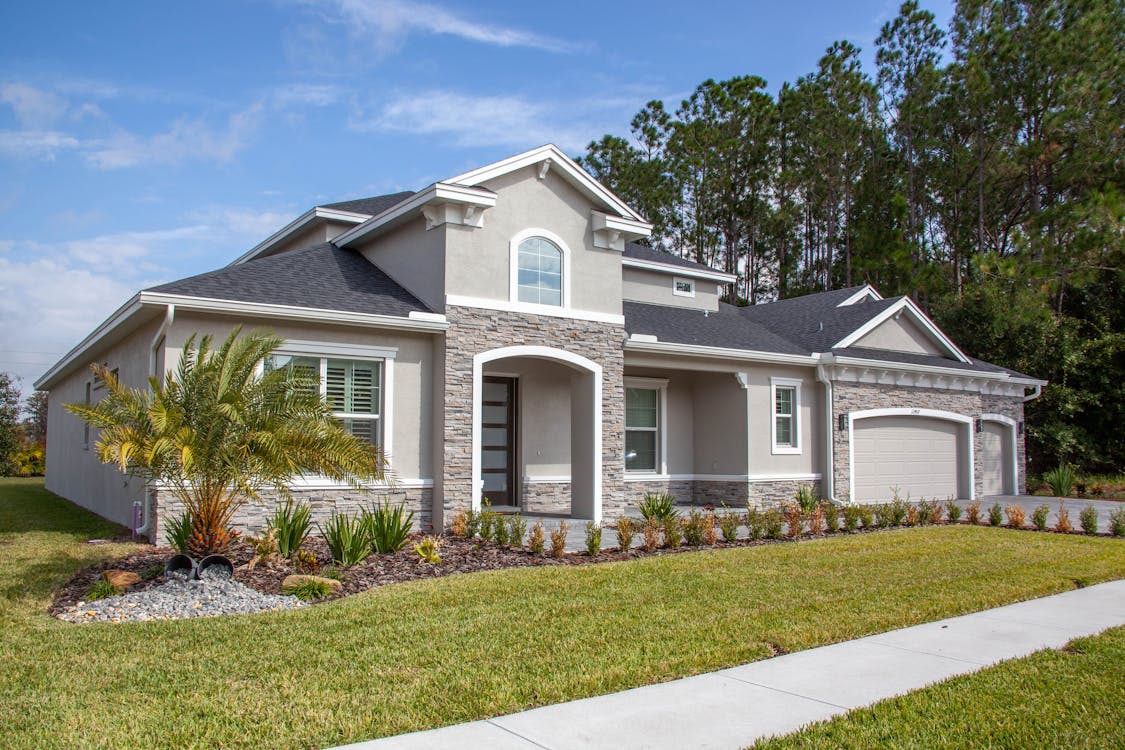 https://crescentnb.com/wp-content/uploads/2024/06/free-photo-of-view-of-a-modern-family-house-in-the-suburbs.jpeg